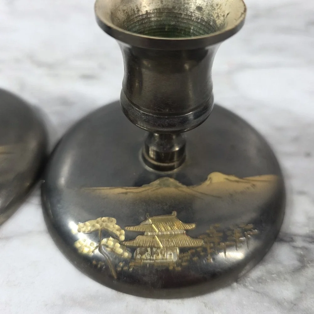 Vtg Pair Japanese brass bud vases featuring an etched pagoda and mountain scene